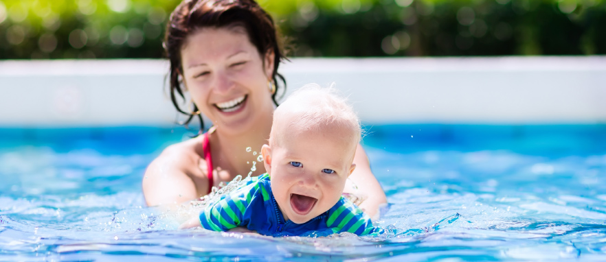 Lady and baby in swimming pool